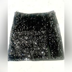 black sequin mini skirt